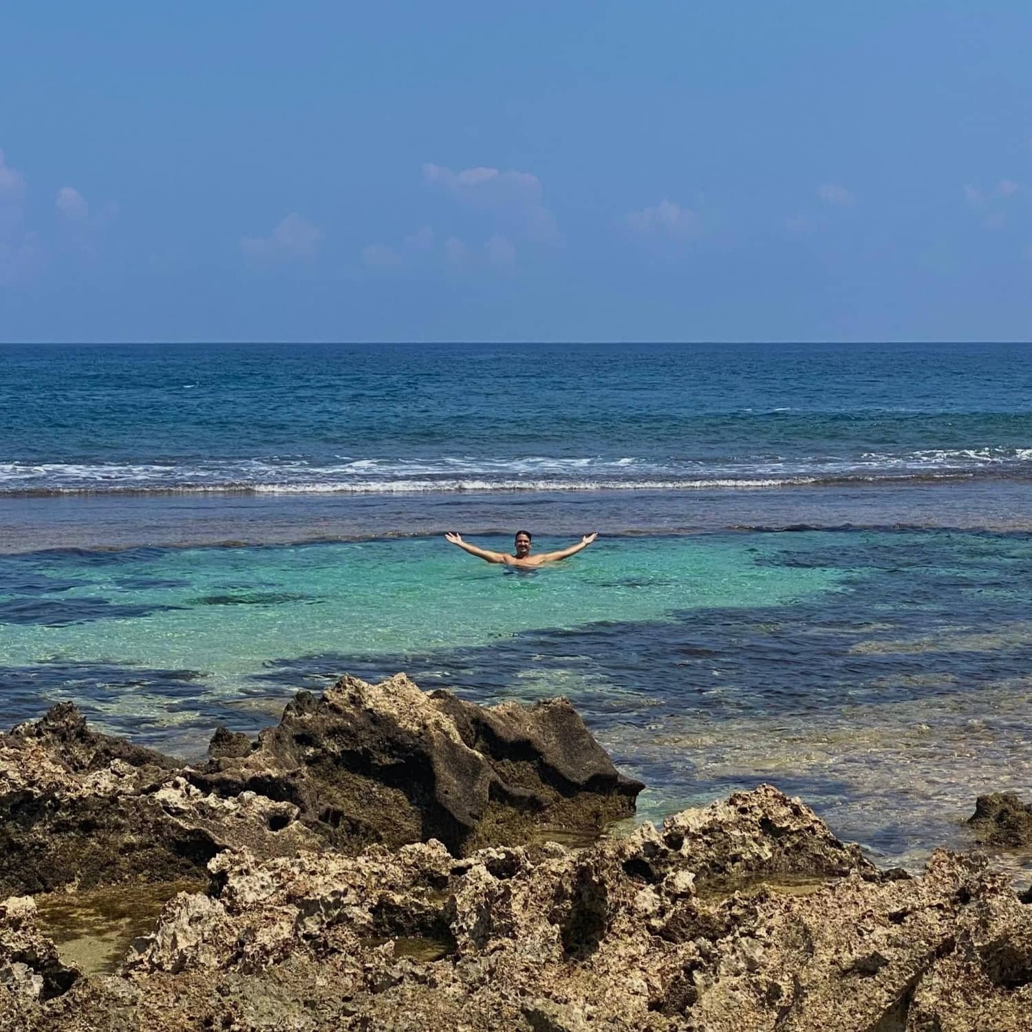 jamie enjoying the rock pools in siargao